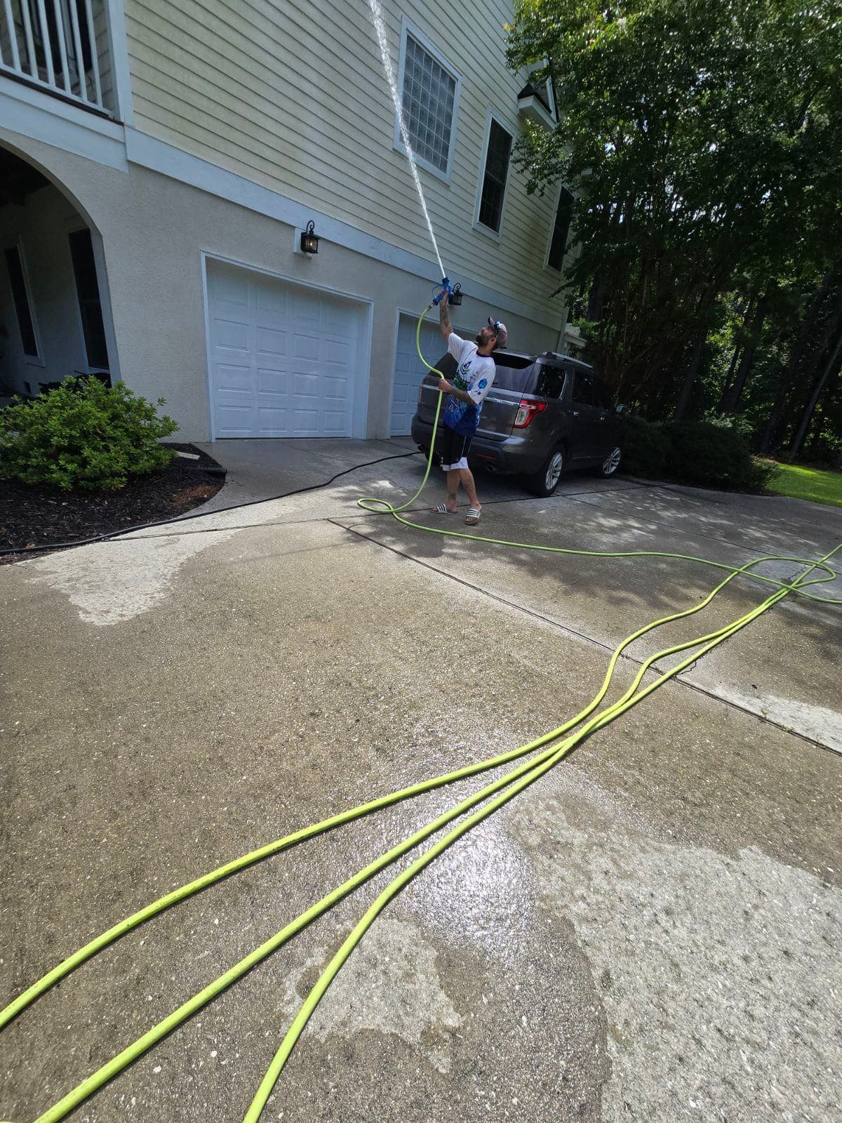 Pressure Washing Tall Residential Walls